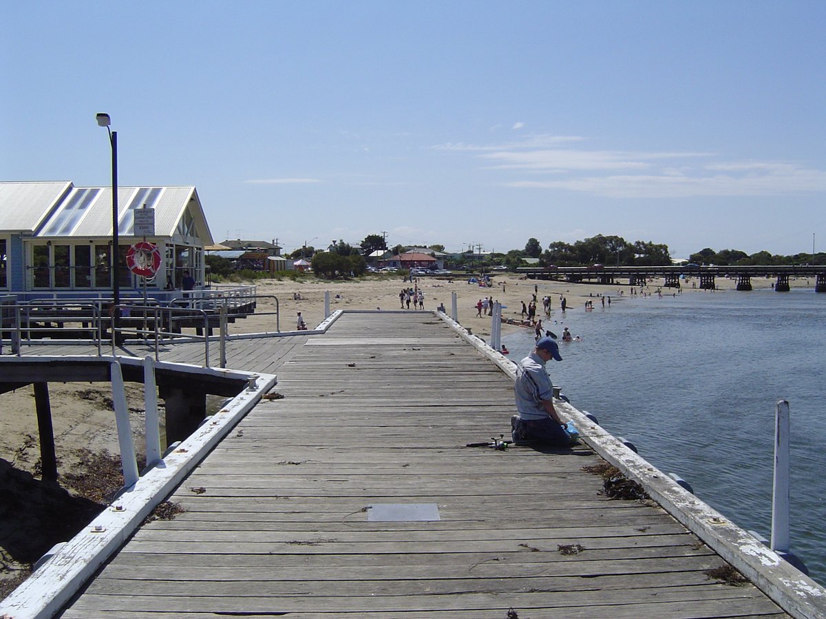 Angler fishing from Barwon Heads Pier in Victoria